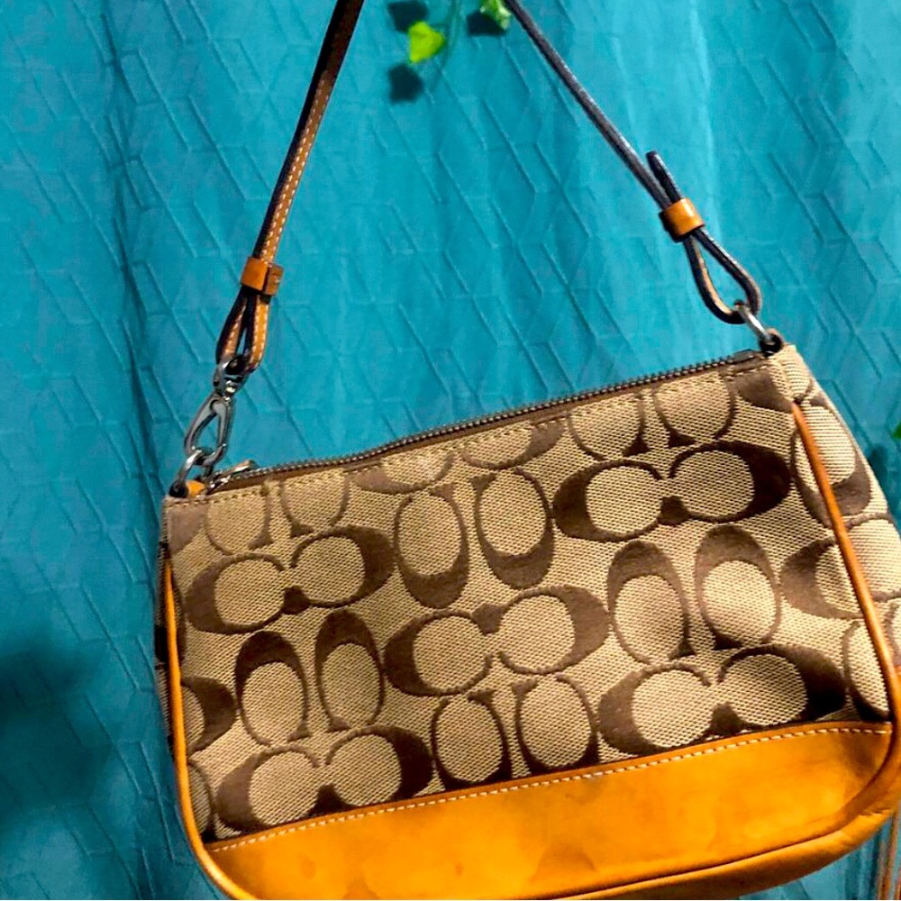 Coach vintage purse little water damage on outside but good condition
